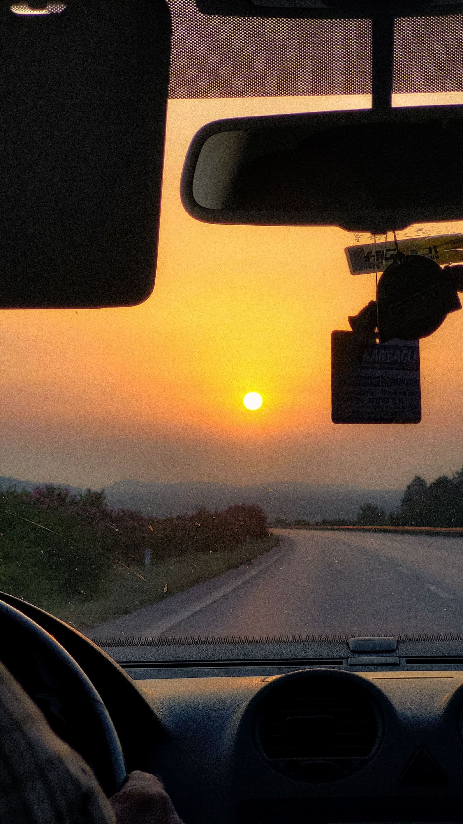 View from a truck cab at sunset, the road ahead for a new owner